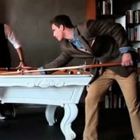 Male JCPenney clothes models playing pool